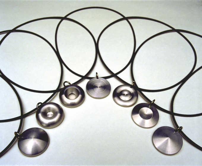 Turned aluminium pendants with nitrile rubber bands - Image Sam Karanikos