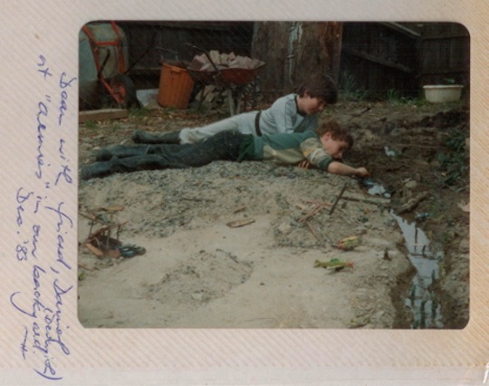 Dean with his river games & military battleground landscape - A pickaxe and a water hose - Dec 1983 - Image Doreen Homicki