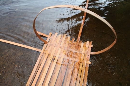 'A deck emerges, now floating in the stream, if not owned by the water, naturally appearing in the design process' - Tomas Kral workshops Boisbuchet 2012 - Image Dean Homicki