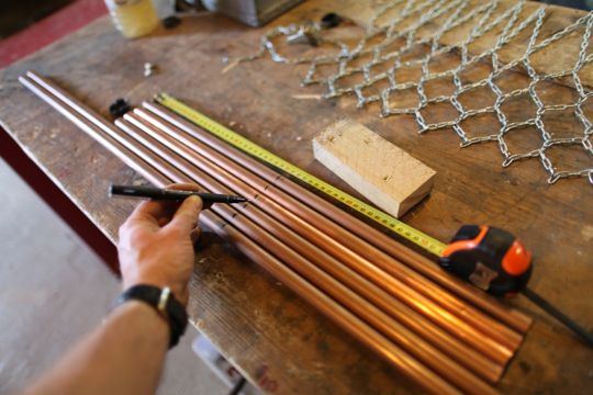 'The copper is cut to size from the schema devised to make the stool - A center line is found as we will work from the inside to the outer edge of each copper tube' – Tomas Kral Boisbuchet – Image Dean Homicki
